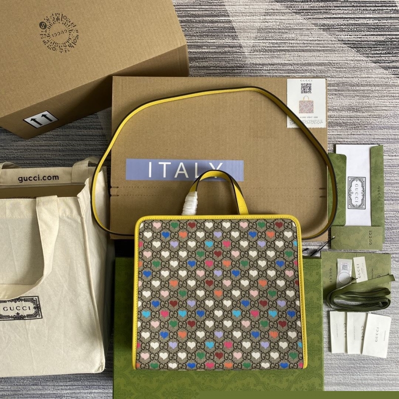 G*u*i shopping bags